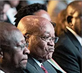  ?? HERMAN VERWEY/AP ?? The election result puts the spotlight on South African President Jacob Zuma, center, who has been criticized for passing off personal upgrades to his home as security expenses.