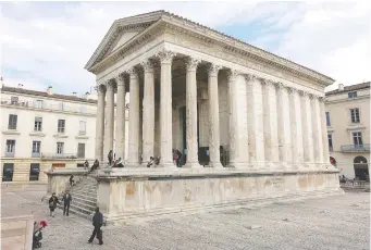  ?? RICK STEVES ?? The ancient temple Maison Carrée is a well-preserved testament to Nîmes’ former glory as a regional capital of the Roman Empire. It has survived for 1,000 years largely because it has been in constant use.