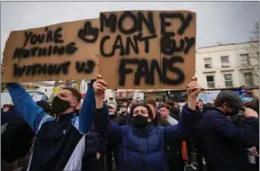  ?? PIC: DAVID LEVENE/THE GUARDIAN ?? Chelsea fans protest against plans for a European Super League in April 2021