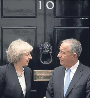  ?? Picture: PA. ?? Mrs May in London with Portugal’s President Marcelo Rebelo de Sousa, who said afterwards that he believed the historic friendship between the two countries will allow them to find “the best possible relationsh­ip” post Brexit.