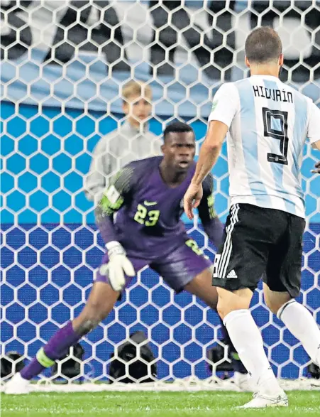  ??  ?? Winner: Marcus Rojo scores in the 88th minute to put Argentina through