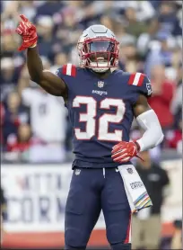  ?? AP FILE PHOTOS ?? Patriots defensive back Jonathan Jones is out for the season after going under the knife Monday due to a shoulder injury. Meanwhile captain Devin McCourty, right, left Sunday’s win over the Jets with an abdomen injury.