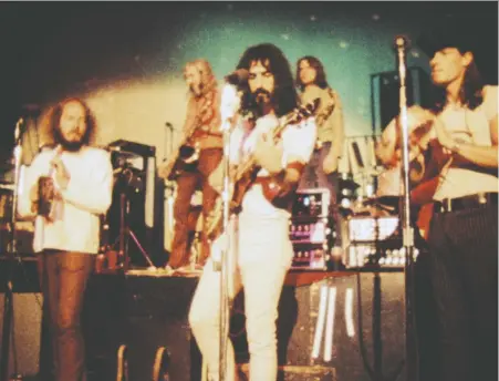  ?? MAGNOLIA PICTURES ?? Frank Zappa, centre, is seen performing with his band, The Mothers of Invention, in a scene from the new documentar­y Zappa.