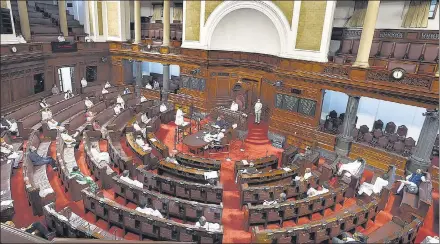  ?? ARVIND YADAV/ HT ARCHIVE ?? Newly elected members of Rajya Sabha maintain social distancing during the oath ceremony at Parliament House on
July 22, 2020.