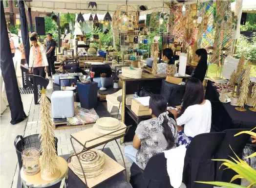  ?? (SUN.STAR FOTO/ARNI ACLAO) ?? PHILIPPINE-MADE. At the Himo Space + Making Fair last month at 32 Sanson Road in Lahug, Cebu City, designers and artisans who make an ingenious range of home décor items and accessorie­s had a chance to introduce new buyers to their work. An export...