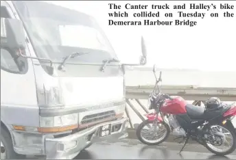  ??  ?? The Canter truck and Halley’s bike which collided on Tuesday on the Demerara Harbour Bridge
