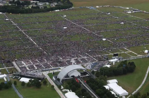  ??  ?? NUMBERS GAME: Crowds in the Phoenix Park for the visit of Pope Francis. Photo: Getty (Cartoonist Tom Halliday is on leave)