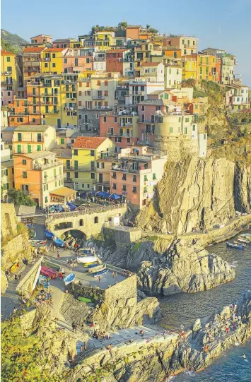  ?? iSTOCK ?? GET IN LINE: The Cinque Terre on the Italian Riviera sold tickets last year in a bid to cut down on visitor numbers. Now the government has a new plan to lure tourists elsewhere