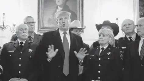  ?? AP ?? President Donald Trump speaks during a meeting with a group of sheriffs from around the country before leaving the White House in Washington on Monday for a trip to El Paso.