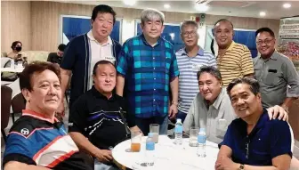  ?? ?? SMILE. Standing from left, Freddie Go, Cokaliong Shipping Line chief executive officer/chief operating officer Chester Cokaliong, Henry Villamor, Joselito Lee and Rudy Chanlim. Seated from left: Youngward Tan, Henry See, Eddie Chua and Allan Yu.