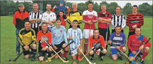  ??  ?? The Shinty All Stars who took part in the Billy Irving benefit match with Yvonne MacHugh and the couple’s son William ahead of the old guns coming out on top by winning 4-2 at Taynuilt.