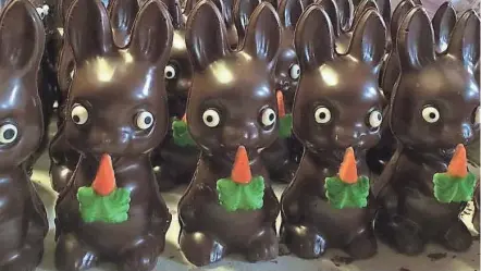  ?? PROVIDED BY EAGLE FAMILY CANDY COMPANY LLC ?? Customers are snatching up these hand-poured, solid chocolate Easter bunnies as fast as Eagle Family Candy Company LLC can make them.