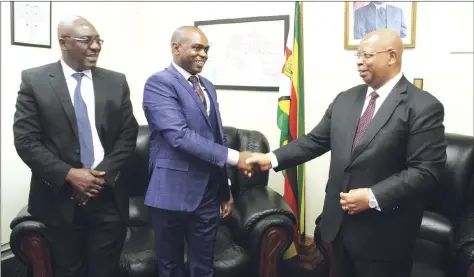  ??  ?? National Assembly speaker Advocate Jacob Mudenda (right) welcomes the new Law Society of Zimbabwe president Mr Misheck Hogwe (centre) and his deputy Mr Thandaza Masiye Moyo at this Parliament Building offices in Harare on Wednesday. - (Picture by...