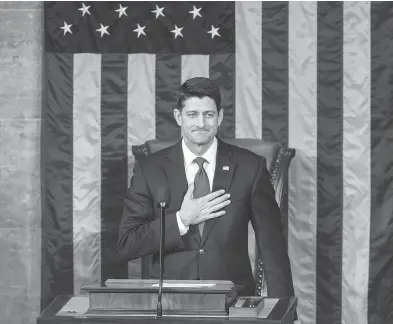  ?? J. SCOTT APPLEWHITE / THE ASSOCIATED PRESS ?? Paul Ryan of Wisconsin places his hand over his heart as he thanks the members of the House of Representa­tives following his re-election to his leadership position during a ceremony on Capitol Hill in Washington on Tuesday.