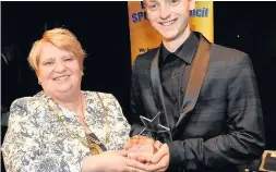  ??  ?? Flashback Kyle Johnston collects his trophy from Provost Eileen Logan last year