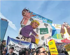  ?? /GETTY IMAGES ?? Una manifestac­ión contra Trump y sus aliados en las calles de Teherán.