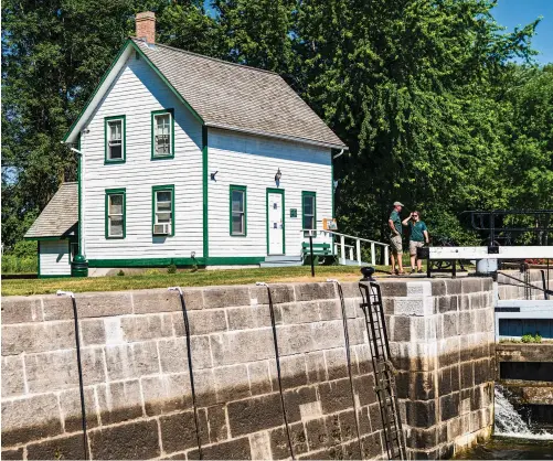  ??  ?? From the lockkeeper­s’ building to the locks themselves, not much has changed since the Rideau opened in 1832. The Rideau River opens wide in parts en route to Merrickvil­le.