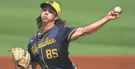  ?? JOE CAMPOREALE / USA TODAY SPORTS ?? Brewers pitching prospect Robert Gasser, who is vying for a spot in the team's starting rotation, allowed one run on three hits with no walks and five strikeouts in four innings of work against the Mariners in a Cactus League game Thursday.