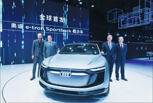  ?? PHOTOS PROVIDED TO CHINA DAILY ?? From left: Marc Lichte, head of design at Audi AG, Dietmar Voggenreit­er, member of the board of management of Audi AG for sales and marketing, Rupert Stadler, chairman of the board of management of Audi AG, and Zhang Pijie, member of the board of...