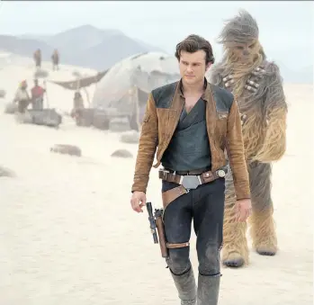  ?? LUCASFILM ?? Alden Ehrenreich, left, and Joonas Suotamo as Chewbacca in Solo: A Star Wars Story. The film’s poor box office performanc­e could be a bad omen for the Star Wars franchise as well as the rest of Hollywood.