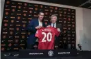  ?? Photograph: Jon Super/AP ?? Van Persie poses alongside Sir Alex Ferguson after signing from Arsenal.