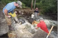  ?? Erik Trautmann / Hearst Connecticu­t Media file photo ?? Representa­tives of DEEP including Peter Grundy and employees of Trout Unlimited, Bill Doyle and Ben Couch, come together in 2018, to jackhammer open the breach at the Cannondale Dam in Wilton. The demolition of the dam is part of a larger project to remove dams from the Norwalk river and restore native fish population­s.