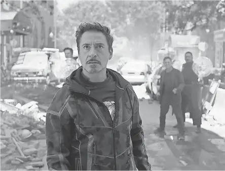 ??  ?? Tony Stark (Robert Downey Jr.) leads the super-troops against Thanos in “Avengers: Infinity War.” MARVEL STUDIOS