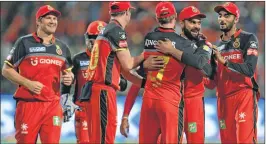  ??  ?? Royal Challenger­s Bangalore is not doing well even after the return of captain Virat Kohli (2R) on the field and are placed at the bottam of the table.