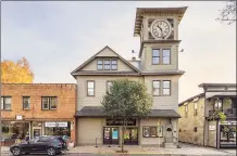  ?? Alon Koppel Photograph­y / Contribute­d photo ?? The Moviehouse in Millerton, N.Y., with its iconic clock tower, is up for sale with an asking price of $1.195 million.