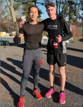  ?? PHOTO PROVIDED ?? Kingston Turkey Trot winner Jack Ruske, left, and second-place finisher Andrew Lee.