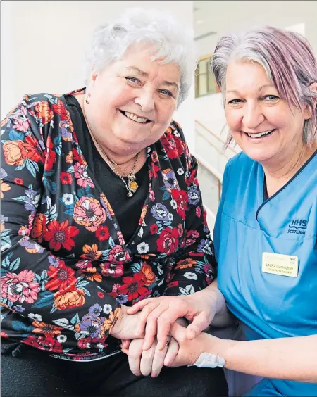  ??  ?? Joan Martin, 74, with nurse Laura Cunningham at Queen Elizabeth University Hospital in Glasgow