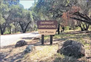  ?? Noelle Carter
Los Angeles Times ?? THE LOS PRIETOS Campground has a variety of sites, each with a table, grill and campfire ring. Do your research first so you can avoid camping near restrooms and trash areas.