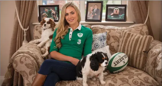  ?? Photo: Mark Condren ?? CJ Stander’s wife Jean-Marie Neethling puts her feet up at home with the couple’s dogs.