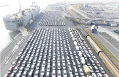  ?? REUTERS ?? Volkswagen cars for export at the German port of Emden.