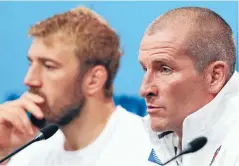  ?? PHOTO: GETTY IMAGES ?? England coach Stuart Lancaster and captain Chris Robshaw front the media after England’s loss to Wales.
