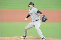  ?? REUTERS ?? NEW YORK YANKEES STARTING PITCHER GERRIT COLE (45) delivers against the Cleveland Indians in the seventh inning at Progressiv­e Field.