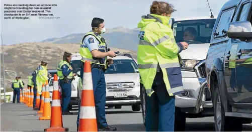  ?? ROSS GIBLIN/STUFF ?? Police are cracking down on anyone who might be travelling for non-essential purposes over Easter weekend. This checkpoint is on SH1 near Plimmerton, north of Wellington.