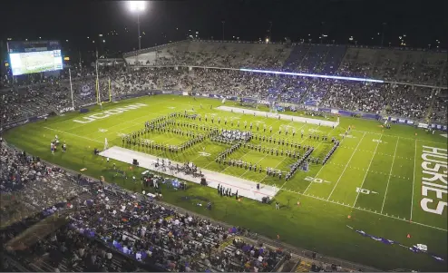  ?? Hearst Connecticu­t Media file photo ?? Opening day football action between UConn and Wagner at Rentschler Field in East Hartford in August 2019.