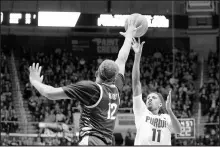  ?? NIKOS FRAZIER/AP ?? Purdue guard Isaiah Thompson (11) shoots against Central Michigan forward Kevin Hamlet.