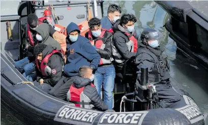  ?? Photo / AP ?? Migrants intercepte­d in June attempting to cross the Channel to England from France.