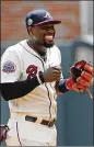  ?? JOHN BAZEMORE / ?? Braves second baseman Brandon Phillips laughs during Sunday’s win over Arizona.