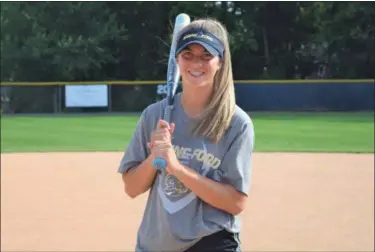  ?? AUSTIN HERTZOG — MEDIANEWS GROUP ?? Above, Spring-Ford sophomore Brianna Peck, The Mercury All-Area Softball Player of the Year, poses for a picture. Below, Peck, with Jules Hughes in the background, begin the celebratio­n after winning the 2019 PAC championsh­ip.