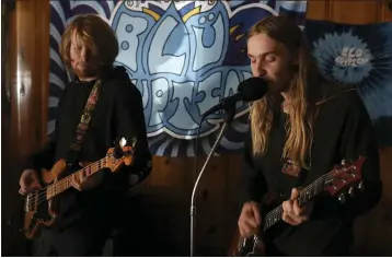  ?? PHOTOS BY CARIN DORGHALLI — ENTERPRISE-RECORD ?? Cam Fuller, left, plays the bass while Don Jules sings for their band, Blue Egyptian on Wednesday in Chico.