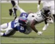  ?? SETH WENIG - THE ASSOCIATED PRESS ?? Giants’ Landon Collins, left, tackles Jaguars’ Leonard Fournette during game Sept. 9, 2018, in East Rutherford, N.J.