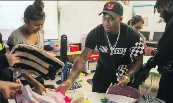  ?? LIAM RICHARDS ?? Saskatchew­an Roughrider­s defensive back Jovon Johnson has made it his mission to help others, such as providing backpacks full of school supplies for local youth.