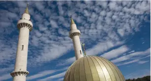  ?? (Ronen Zvulun/Reuters) ?? A NEW MOSQUE and its minarets are seen in Abu Ghosh, west of Jerusalem, in 2013.