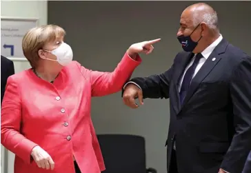  ??  ?? Elle l’adore. Avec Angela Merkel, à Bruxelles, le 17 juillet. « Borissov apporte ses six eurodéputé­s au PPE, dominé par les Allemands, et on lui fiche la paix », dénonce un diplomate. Un échange de bons procédés…