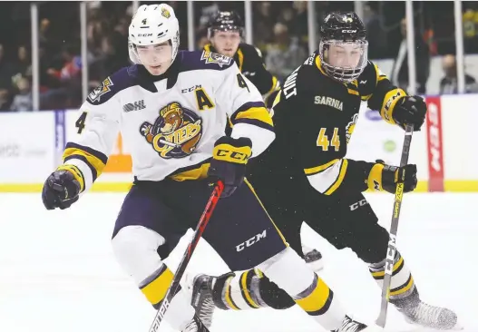  ?? MARK MALONE ?? Defenceman Jamie Drysdale, left, and his Team Canada teammates are eager to get out of isolation and back on the ice with the IIHF World Junior Championsh­ip coming up.