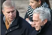  ??  ?? WALKING INTO TROUBLE:
Prince Andrew pictured with Jeffrey Epstein in New York’s Central Park in December 2010