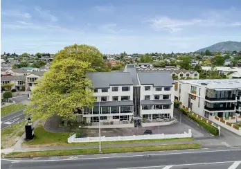  ?? ?? The Tui Oaks Motel Taupo for sale at 84 Lake Terrace has 18 guest accommodat­ion units, a BBQ area, function room with BYO bar facilities, a commercial kitchen, conference room, and laundry facilities.